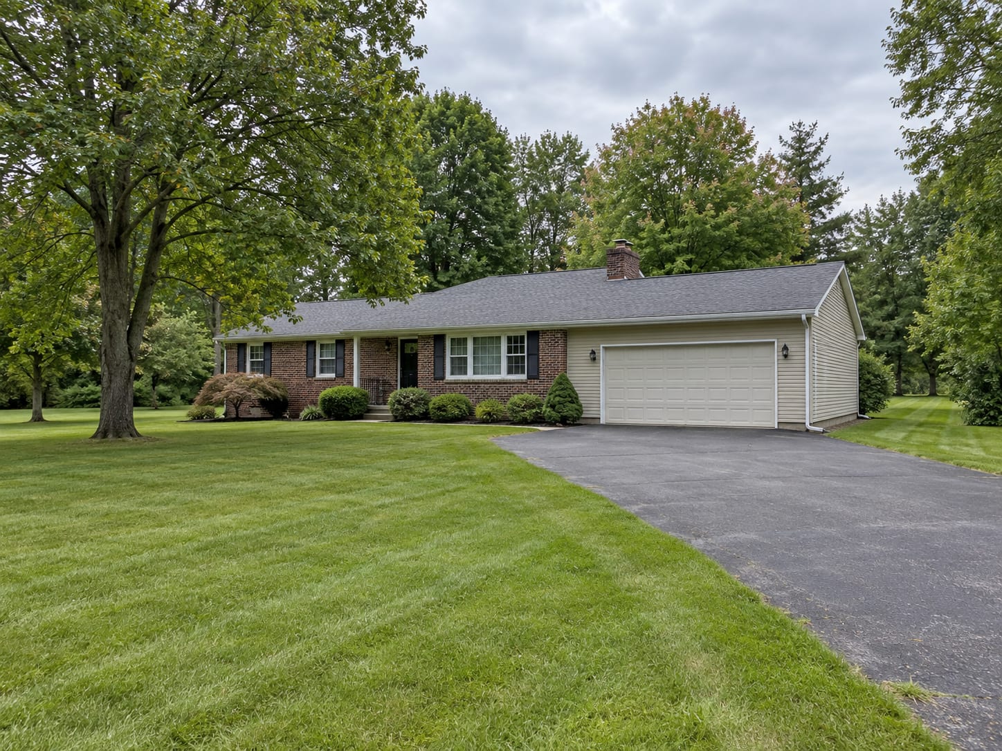 Detached ranch house on a large lot in Bridgewater, New Jersey with a wide open side yard and a clear path along the house to the rear