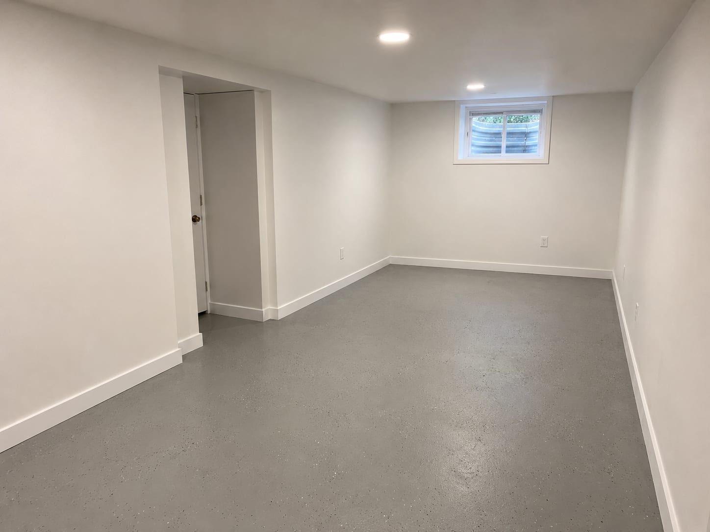 Freshly restored and painted basement interior of a New Jersey home after completed mold remediation